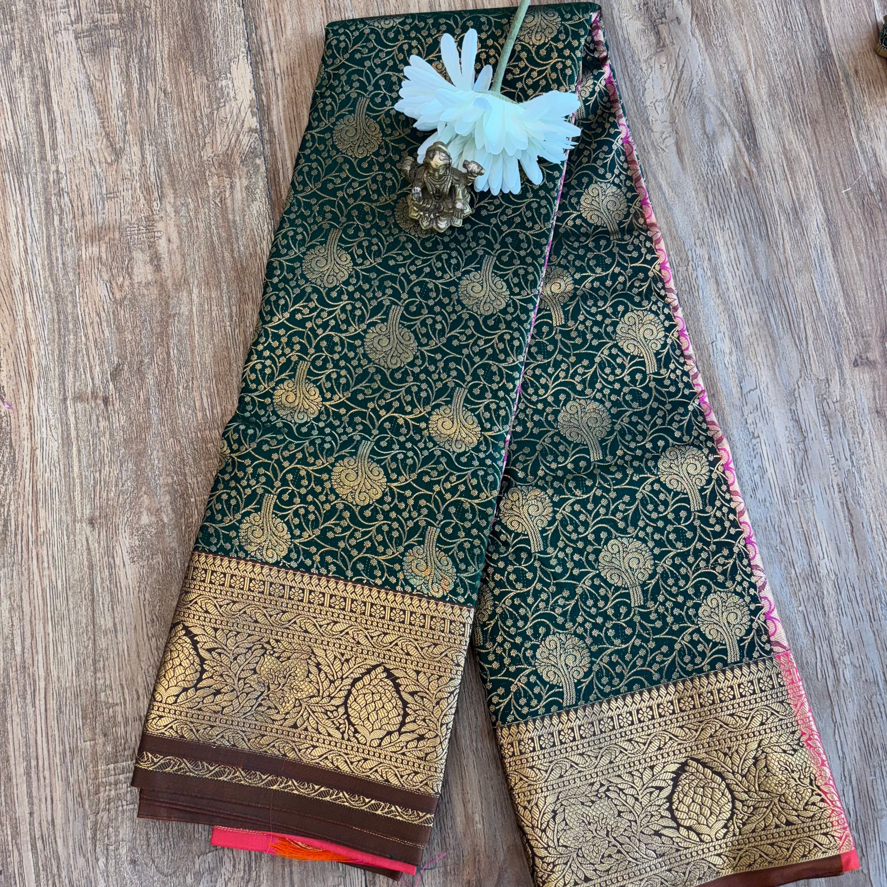 Kanchi Vaidehi beautiful bottle green silk saree