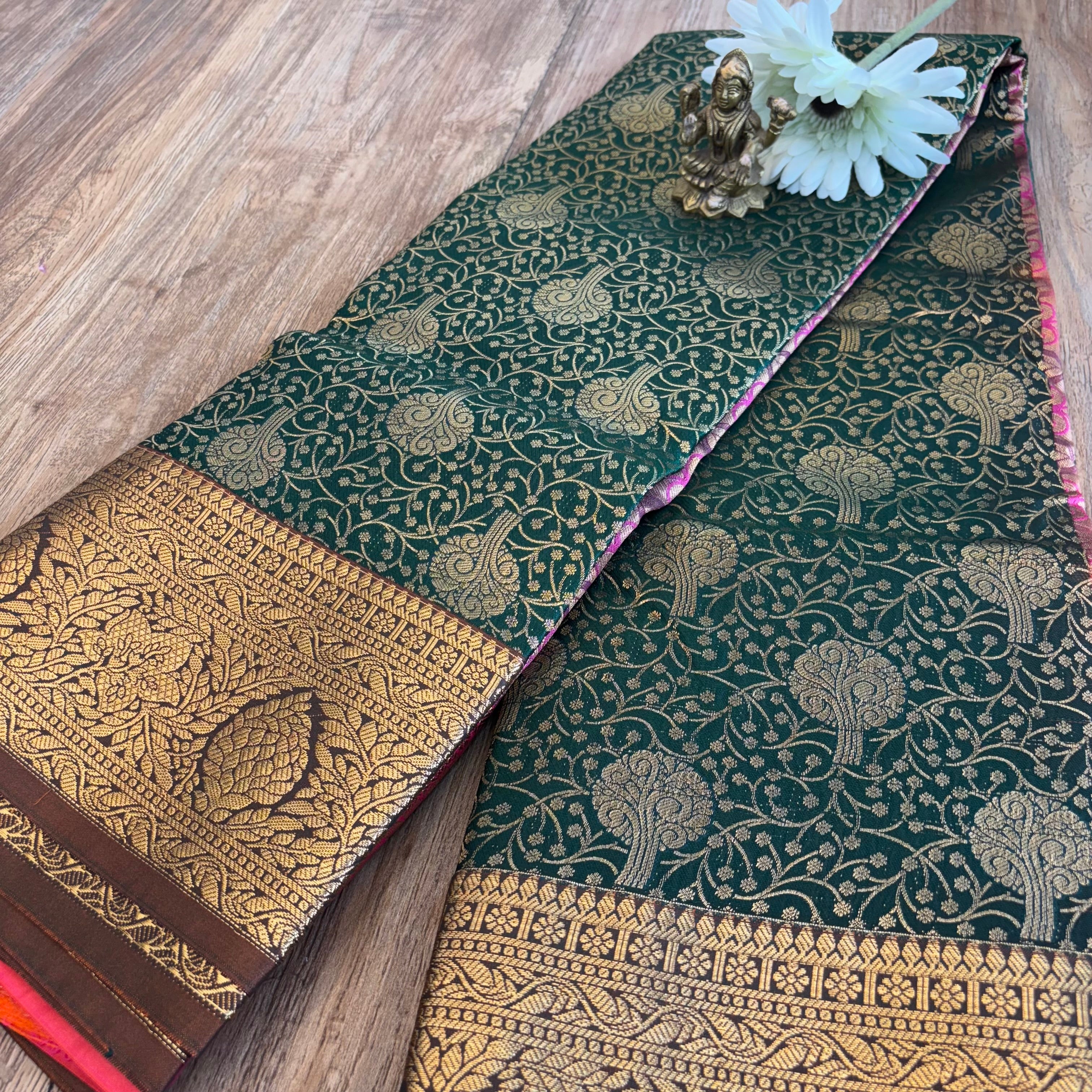 Kanchi Vaidehi beautiful bottle green silk saree